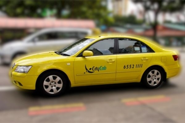 Yellow Licensed Taxi From Singapore To Malaysia